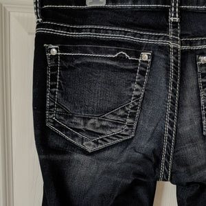 Skinny buckle dark wash jeans